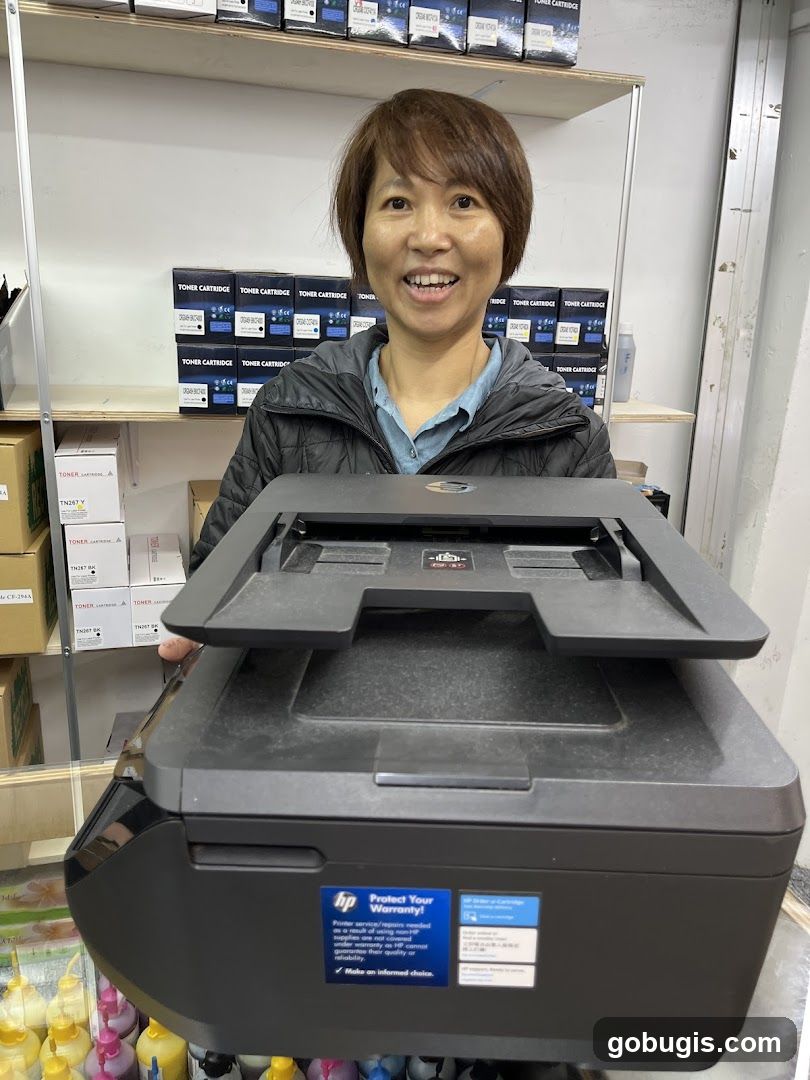 Woman holding a printer