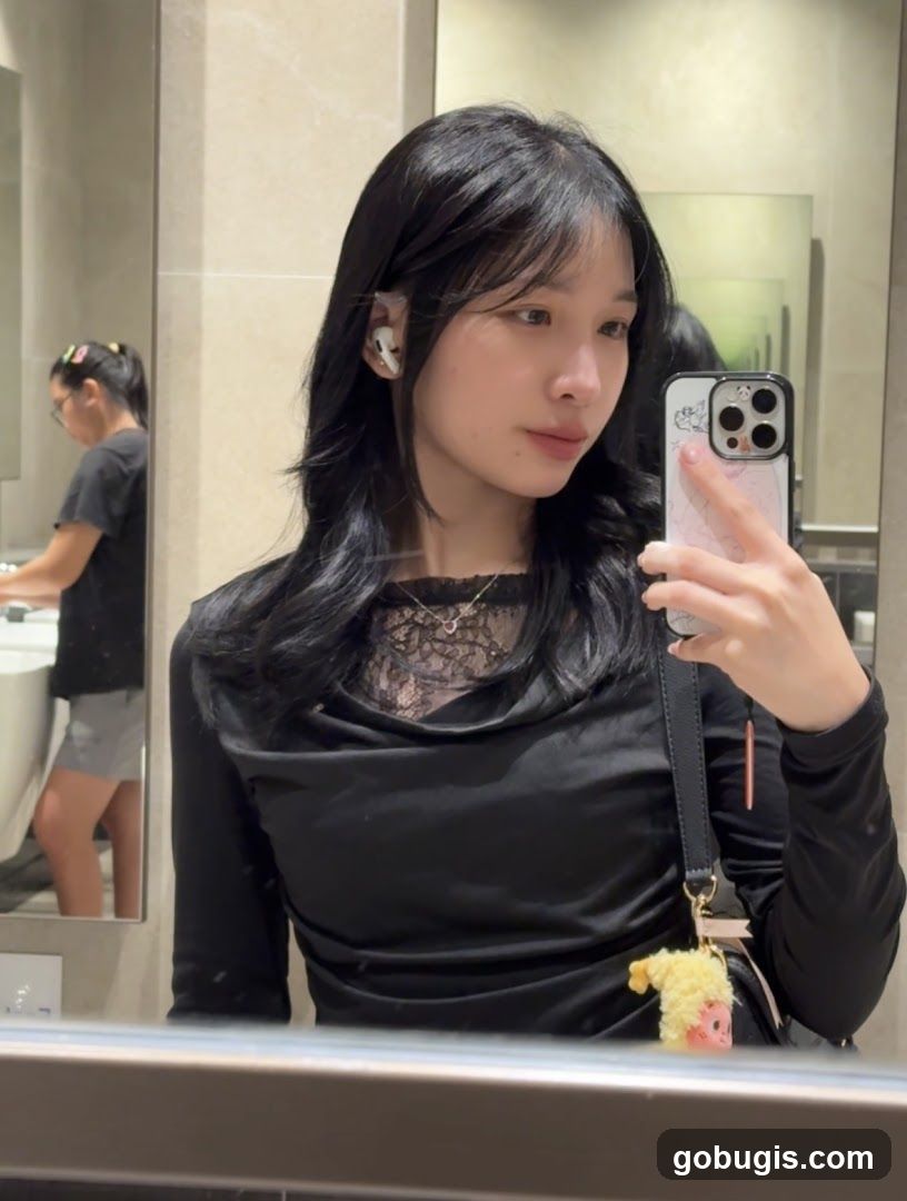 Woman Taking a Mirror Selfie