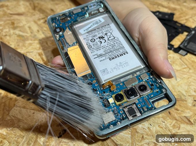 Cleaning a Smartphone Circuit Board