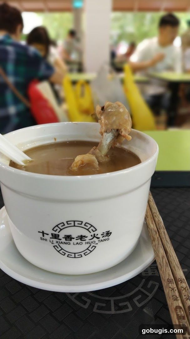 Bowl of Soup with Chicken Bone