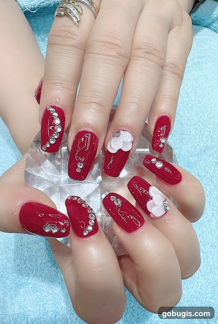 Red Nails with Rhinestones and Flowers