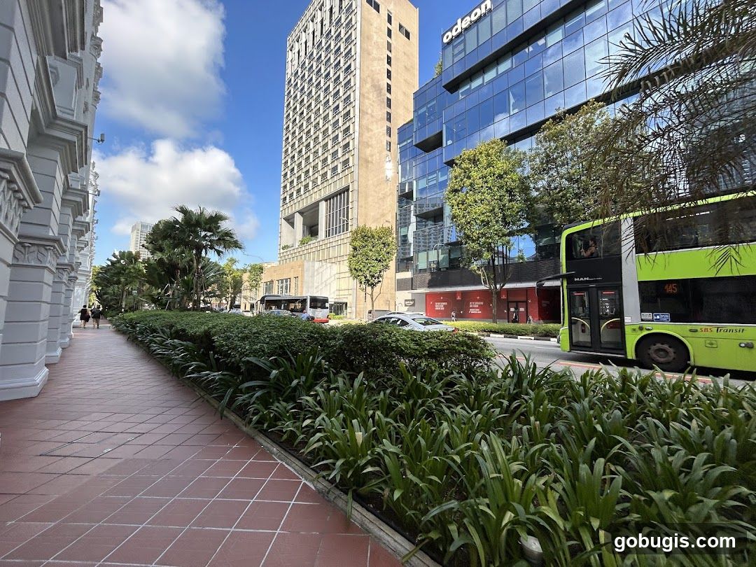 City street with modern buildings and greenery