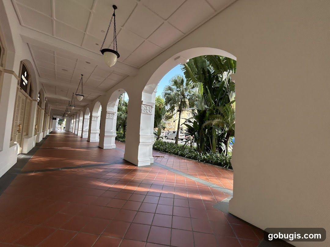 Covered Walkway with Arches and Tropical Plants