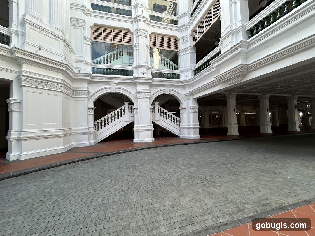 Grand White Building with Arches and Staircases