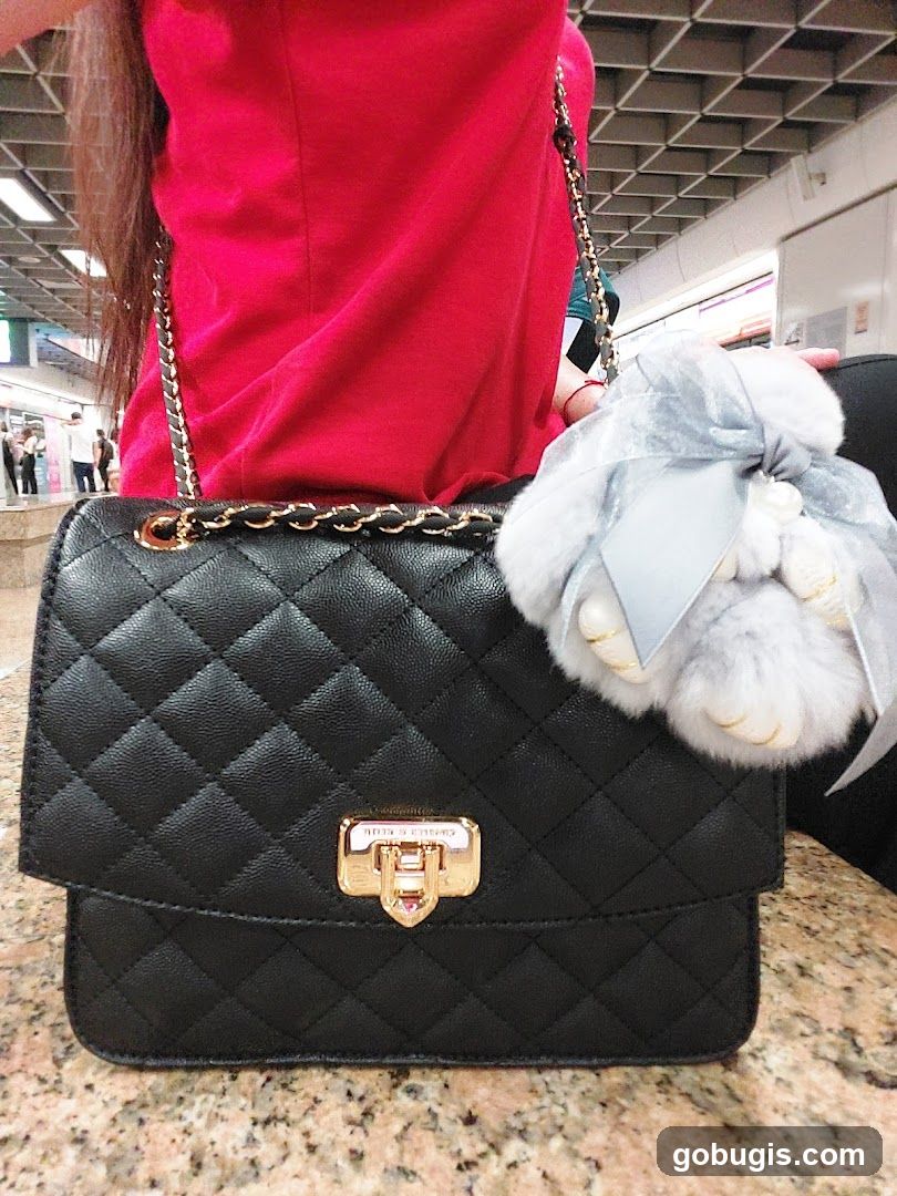 Quilted Handbag with Charm