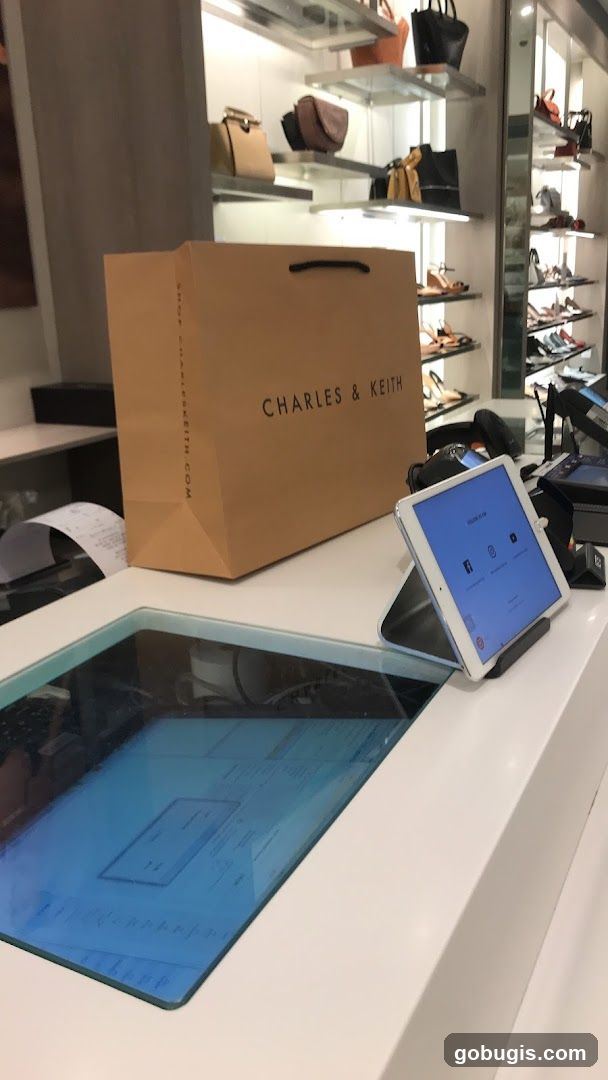 Retail Store Counter with Shopping Bag and Tablet