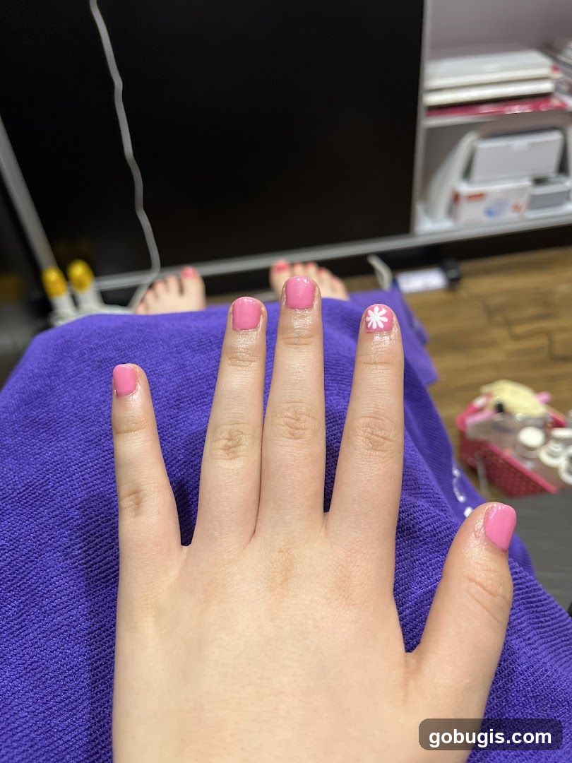 Pink Nails with Flower Design