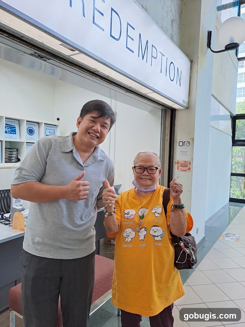 Two people giving thumbs up