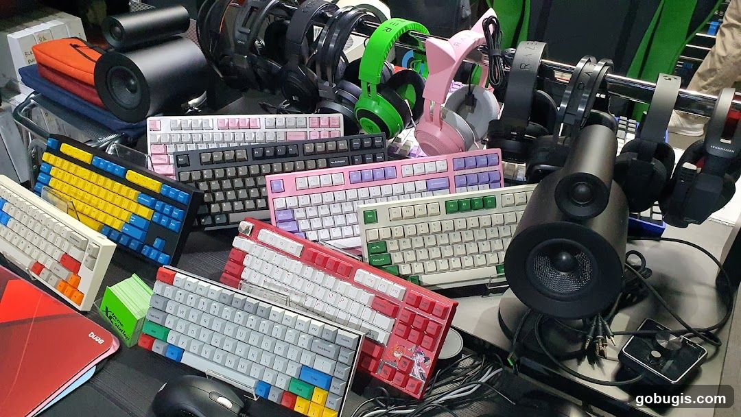 Assortment of Keyboards and Headphones