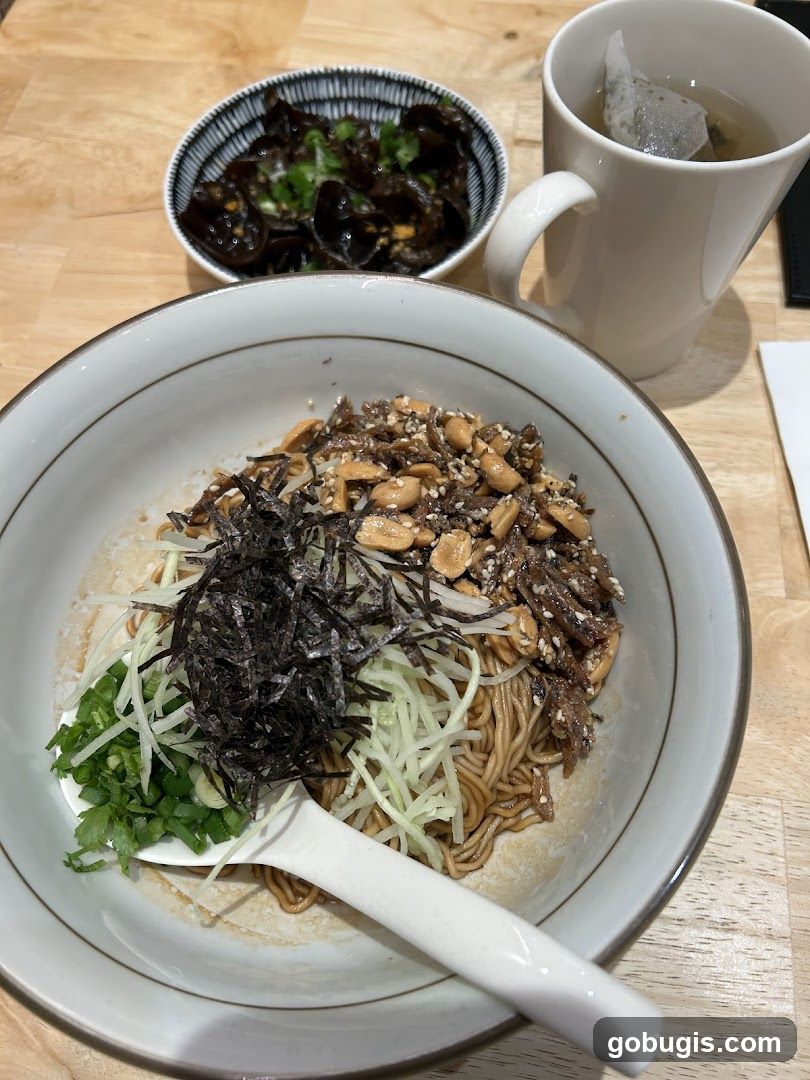 Noodle Dish with Side and Tea