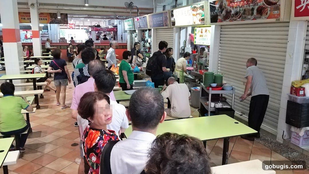 Food court with people queuing