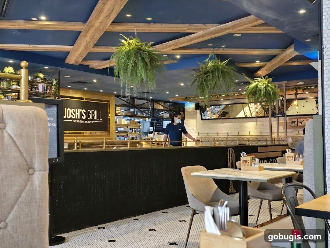 Restaurant Interior with "Josh's Grill" Signage