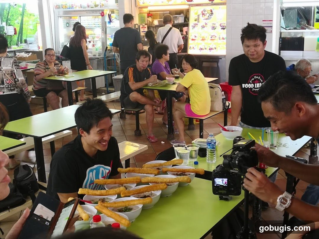 People eating at a food court