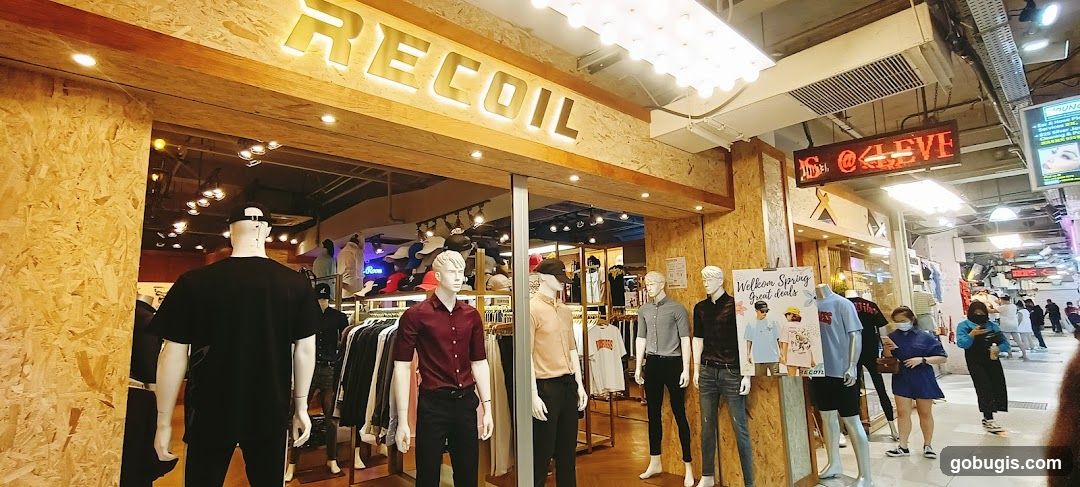 Clothing store with mannequins and signage