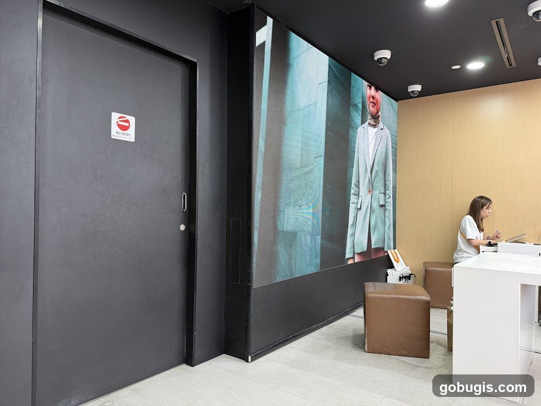 Interior of a store with a large screen display