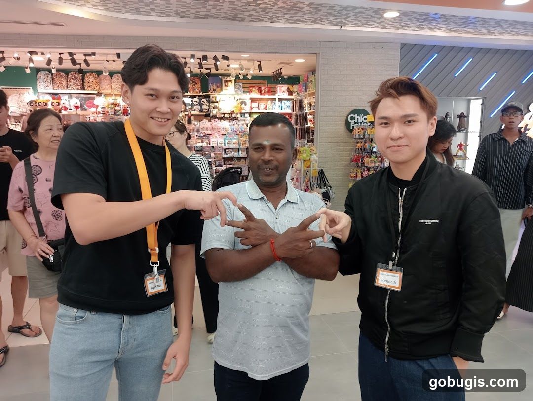 Three men posing for a photo