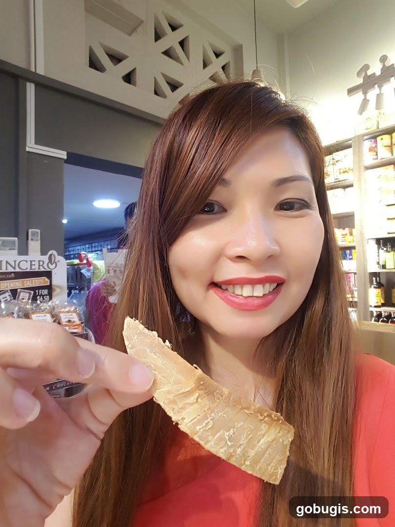Woman holding a piece of food