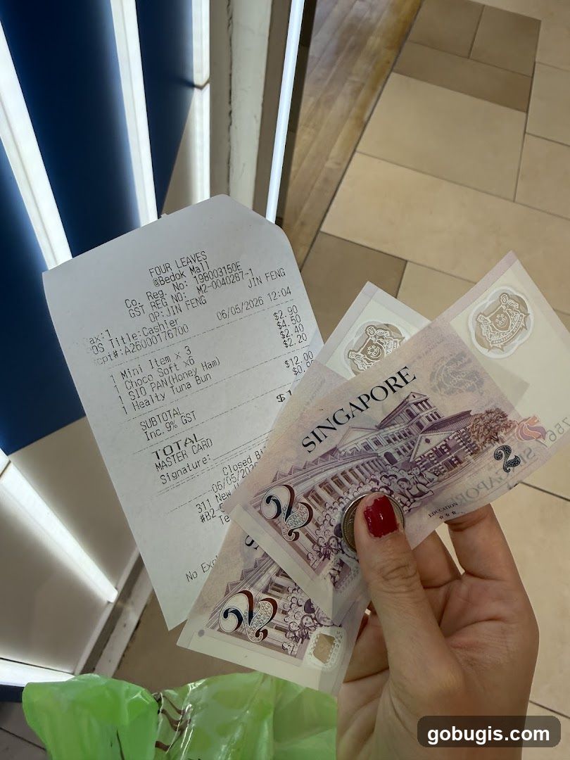 Receipt and Singapore Currency