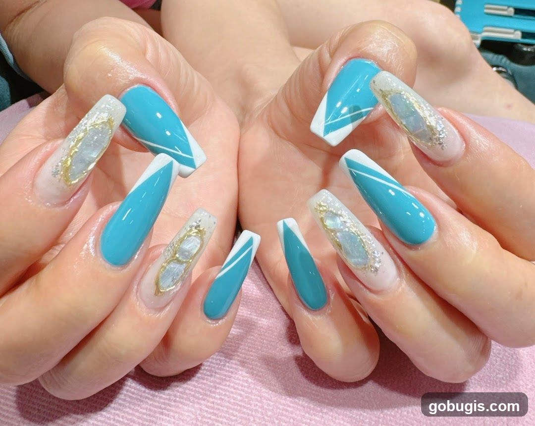 Teal and White Coffin Nails with Gold and Pearl Accents