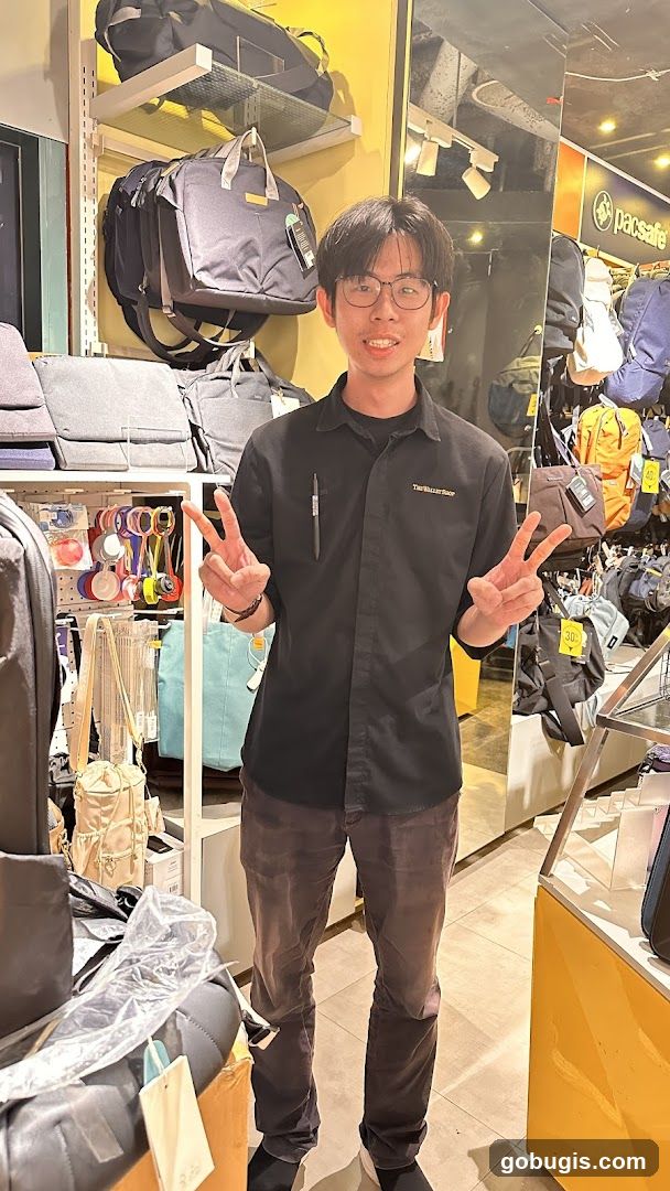 Man in a store with bags
