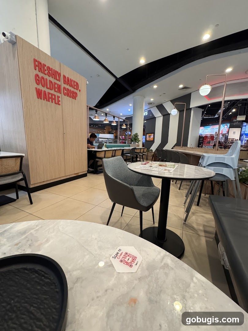 Cafe Interior with Waffle Signage
