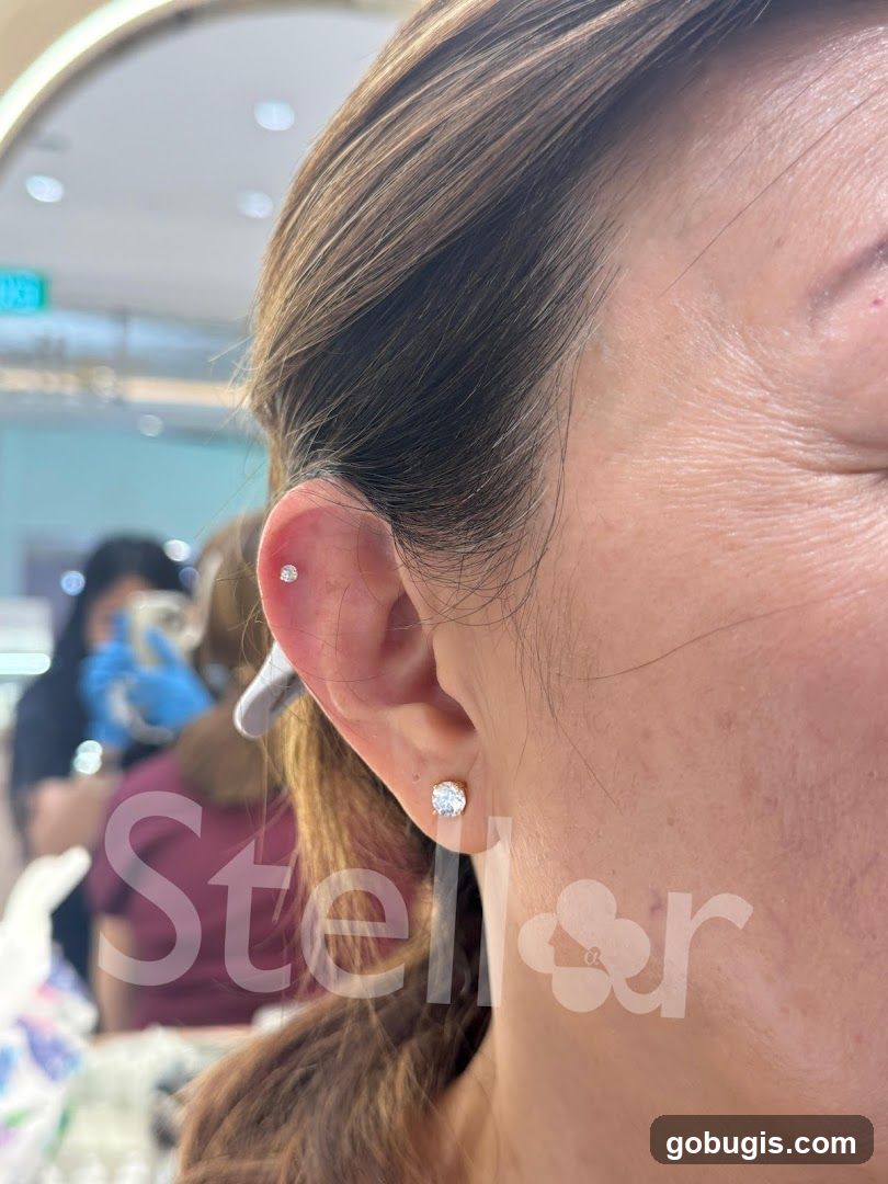 Woman with new ear piercings