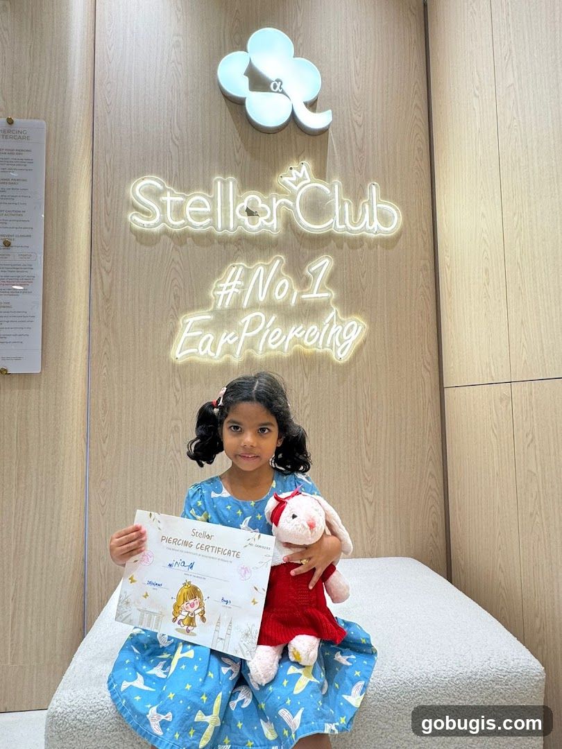 Girl with Piercing Certificate and Stuffed Animal