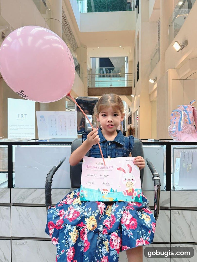 Girl with Piercing Certificate and Balloon