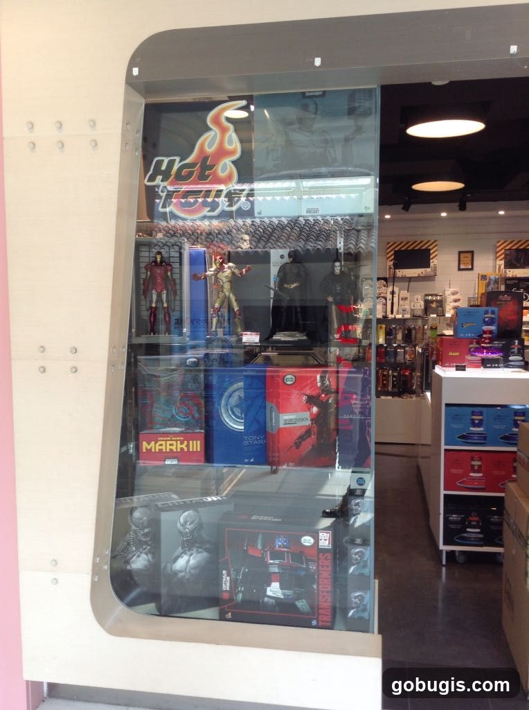 Display case with action figures and collectibles