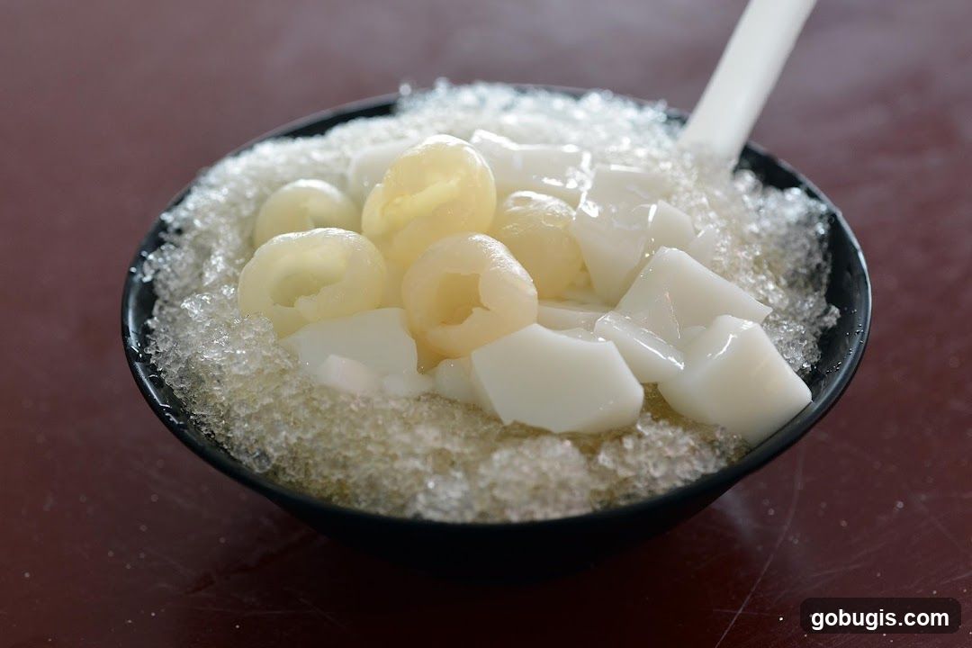 Shaved Ice Dessert with Lychee and Coconut Jelly