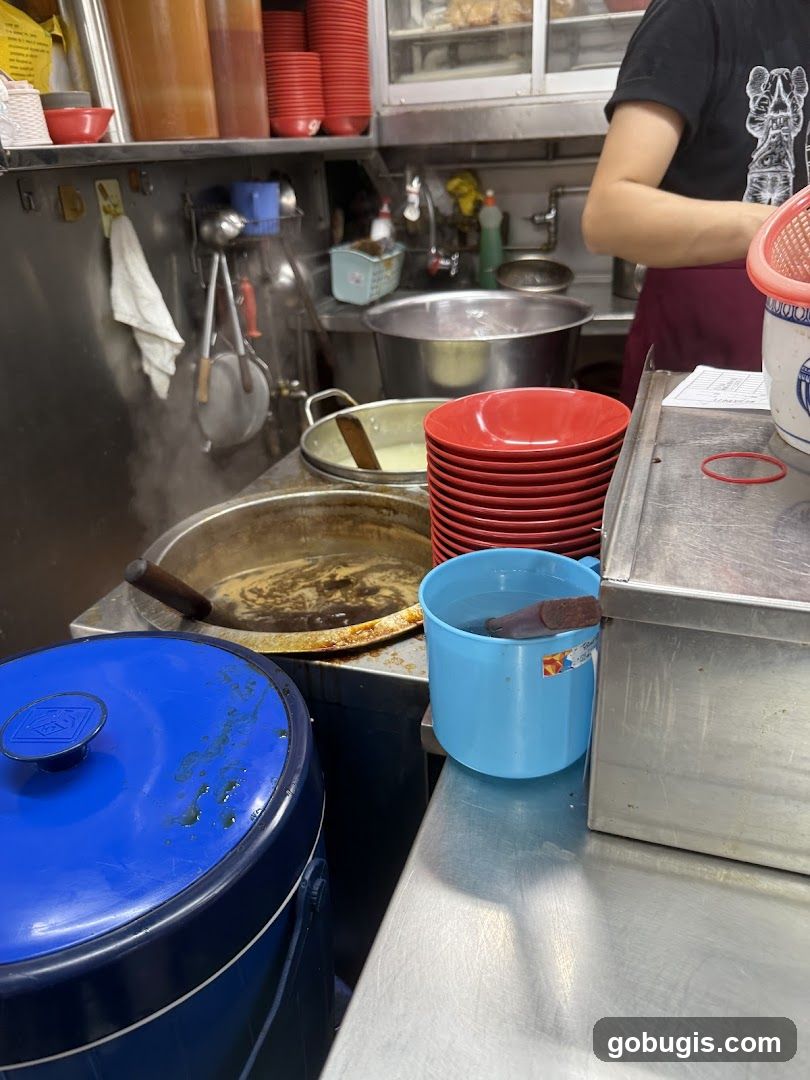 Kitchen Counter with Cooking Pots and Utensils