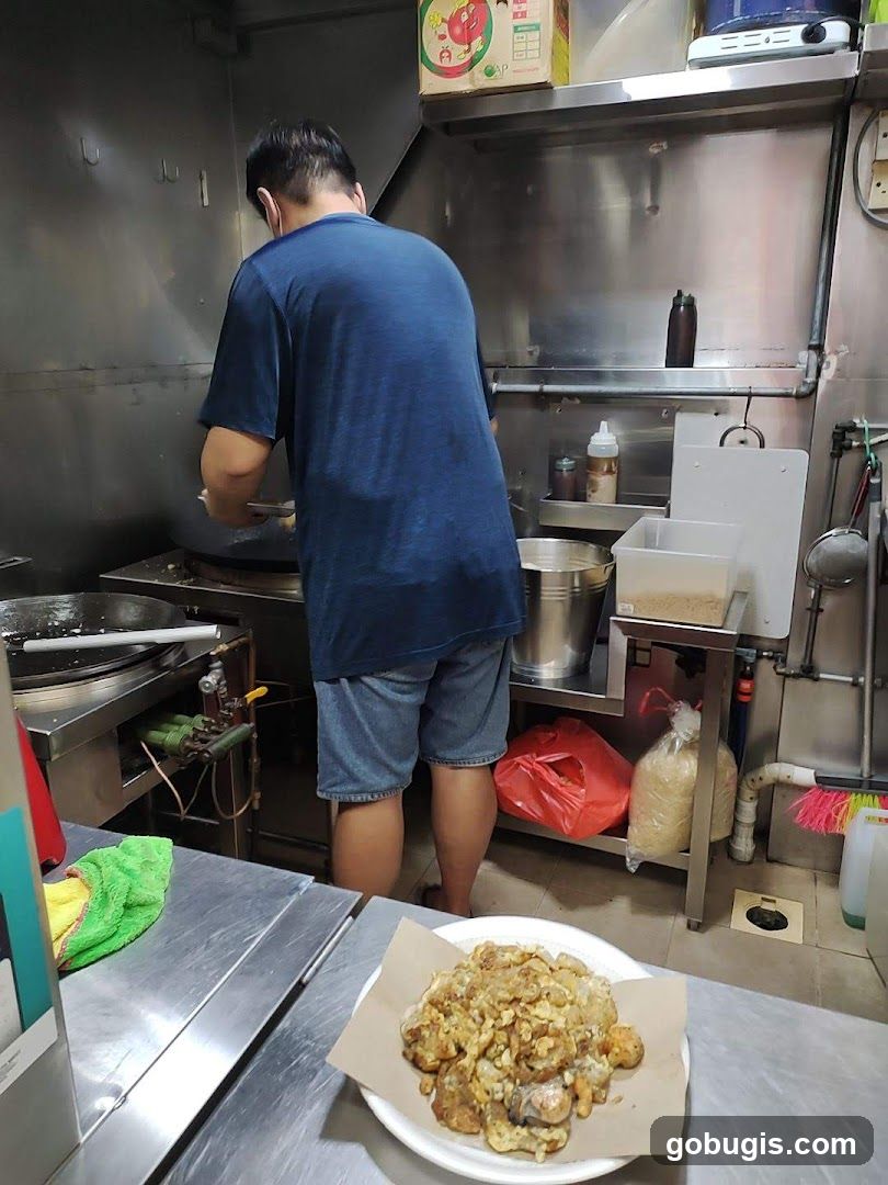 Cook preparing food in a commercial kitchen