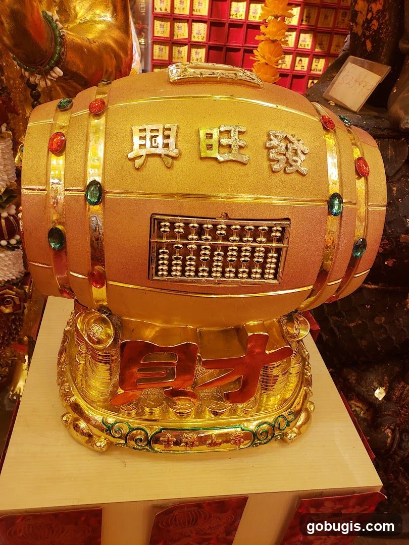 Golden Barrel with Abacus and Chinese Characters
