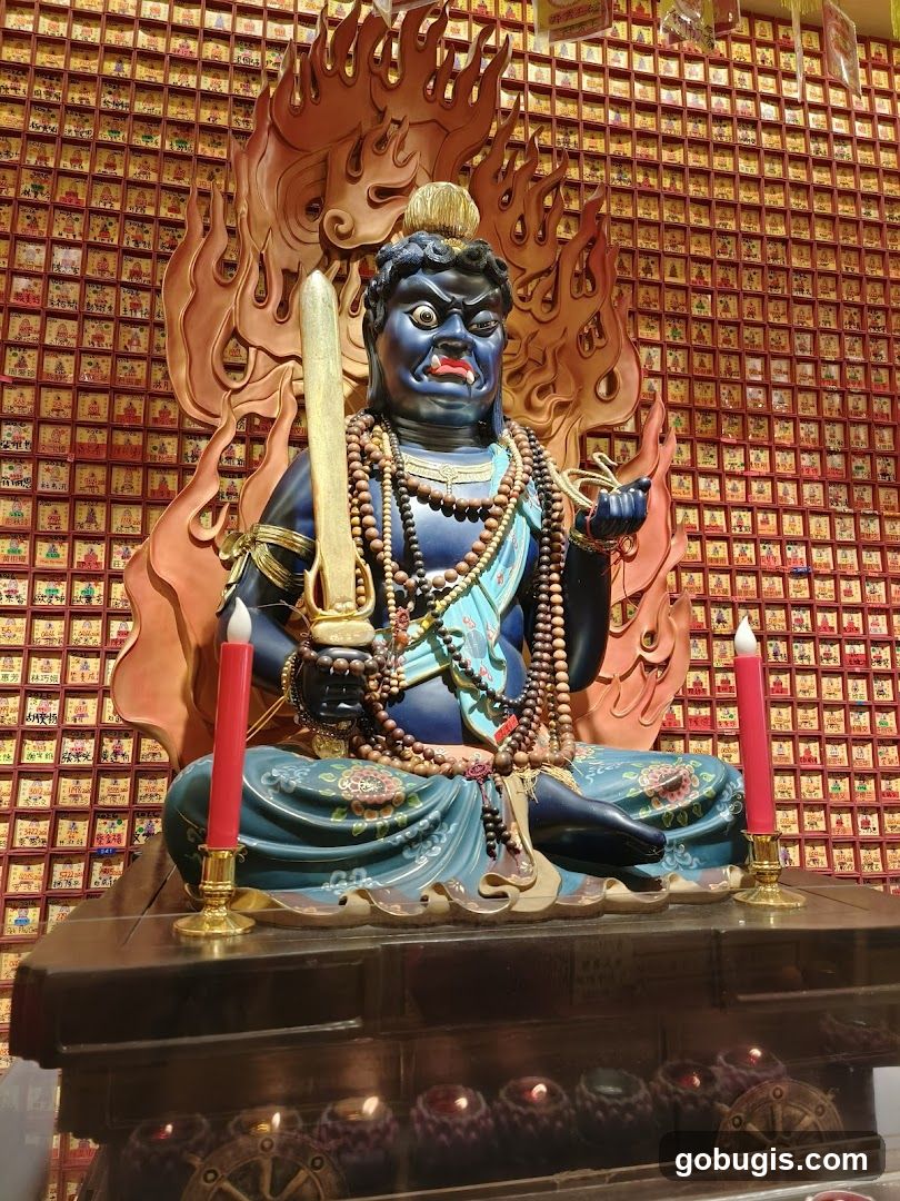 Statue of a deity with a sword