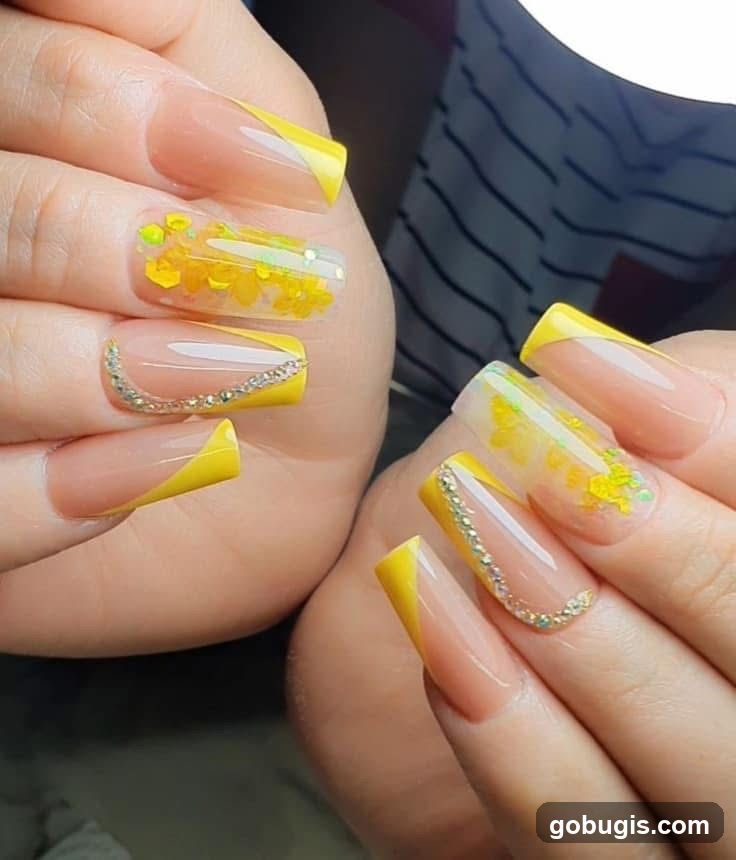 Yellow French Tip Nails with Embellishments