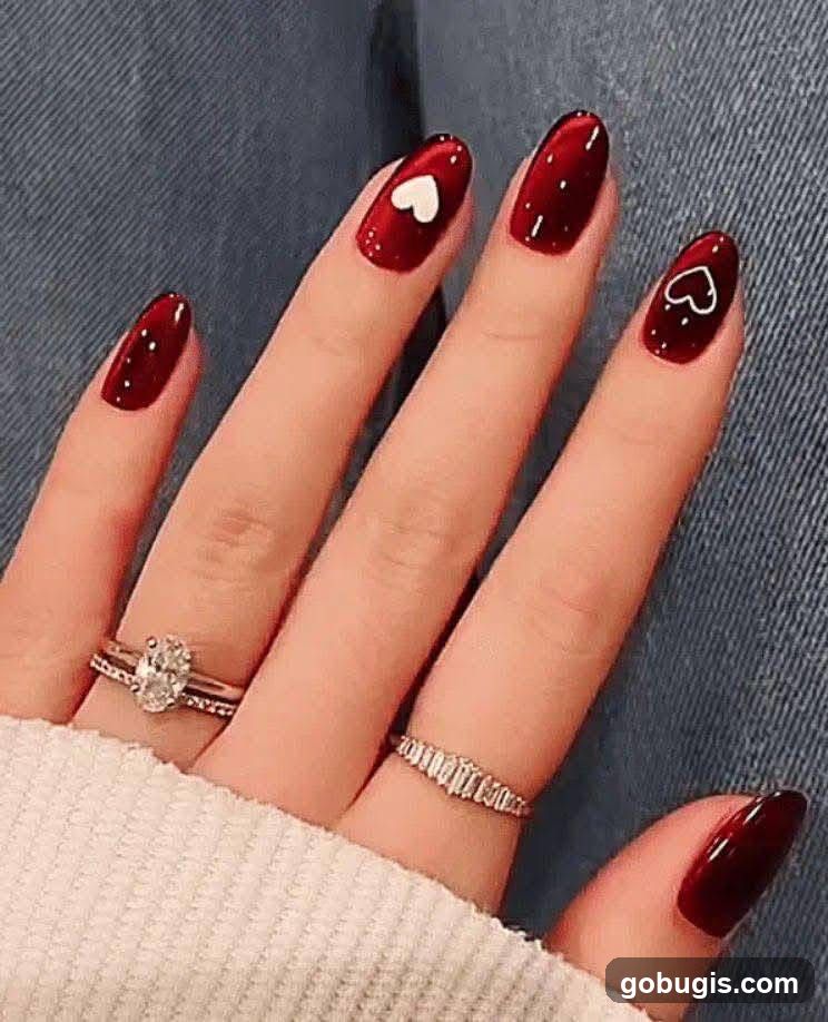 Red Nails with Heart Design