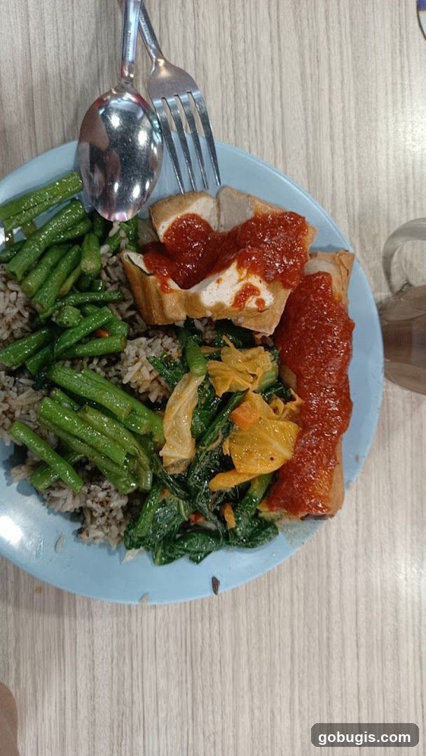 Plate of food with rice and vegetables