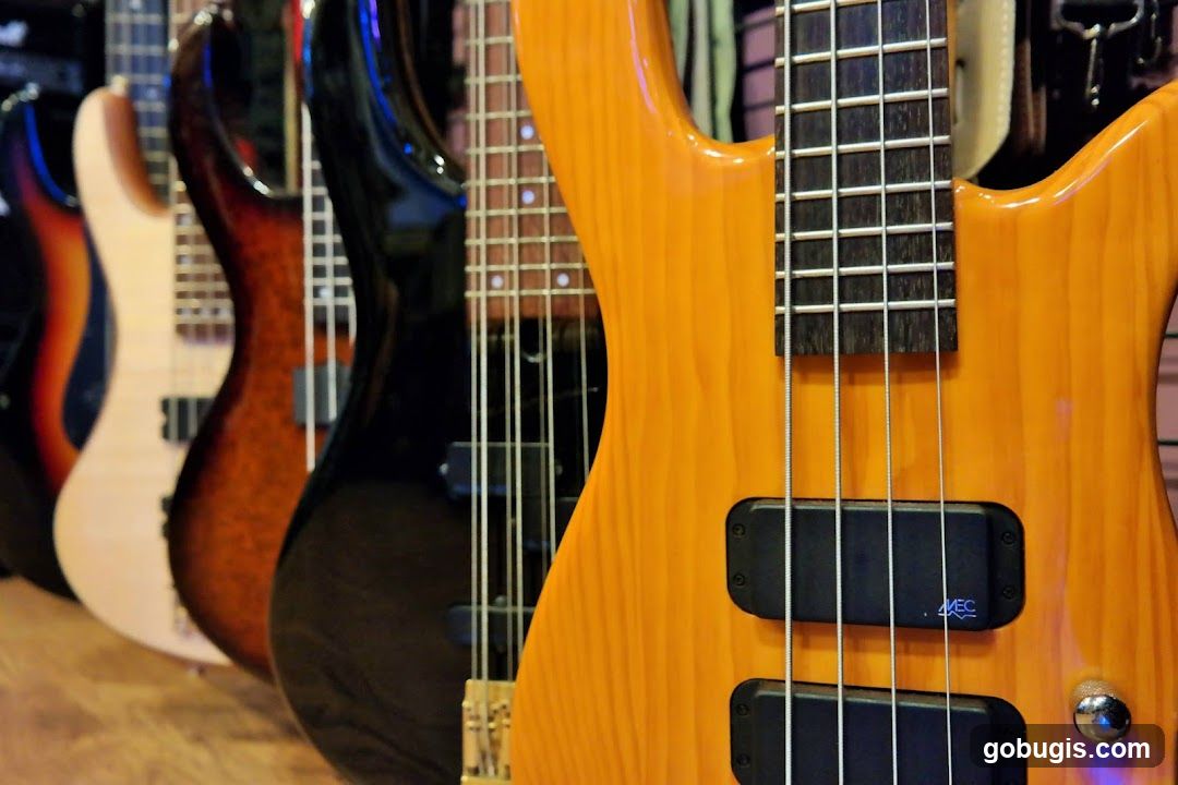 Row of Bass Guitars