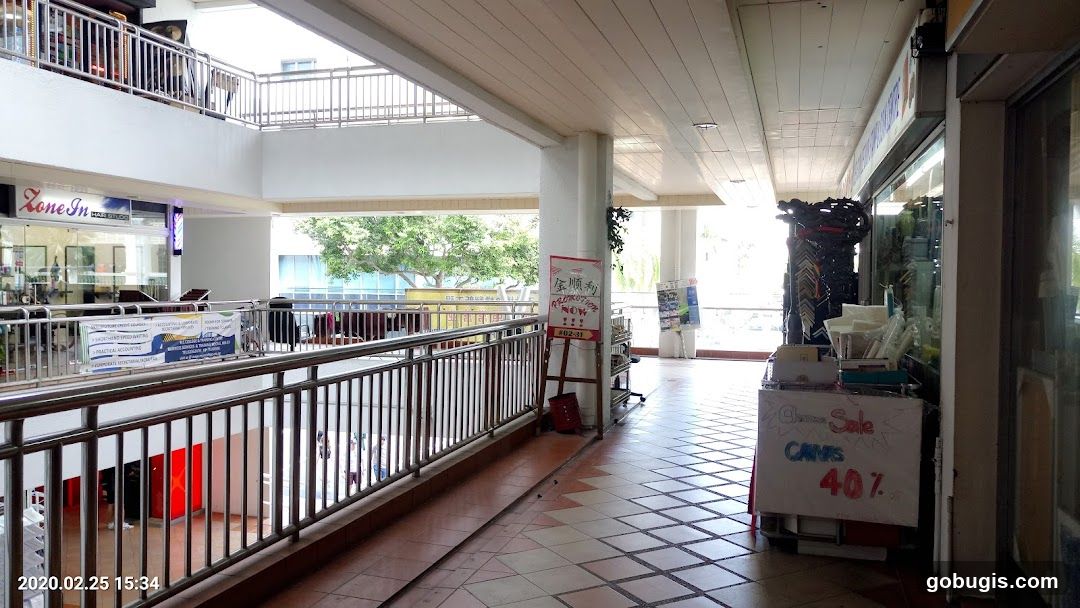 Indoor walkway with shops and promotions