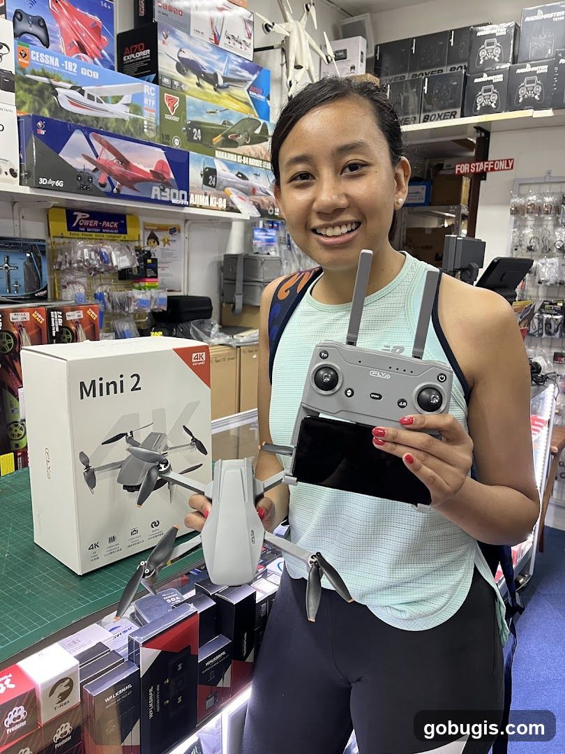 Woman Holding a Drone and Controller