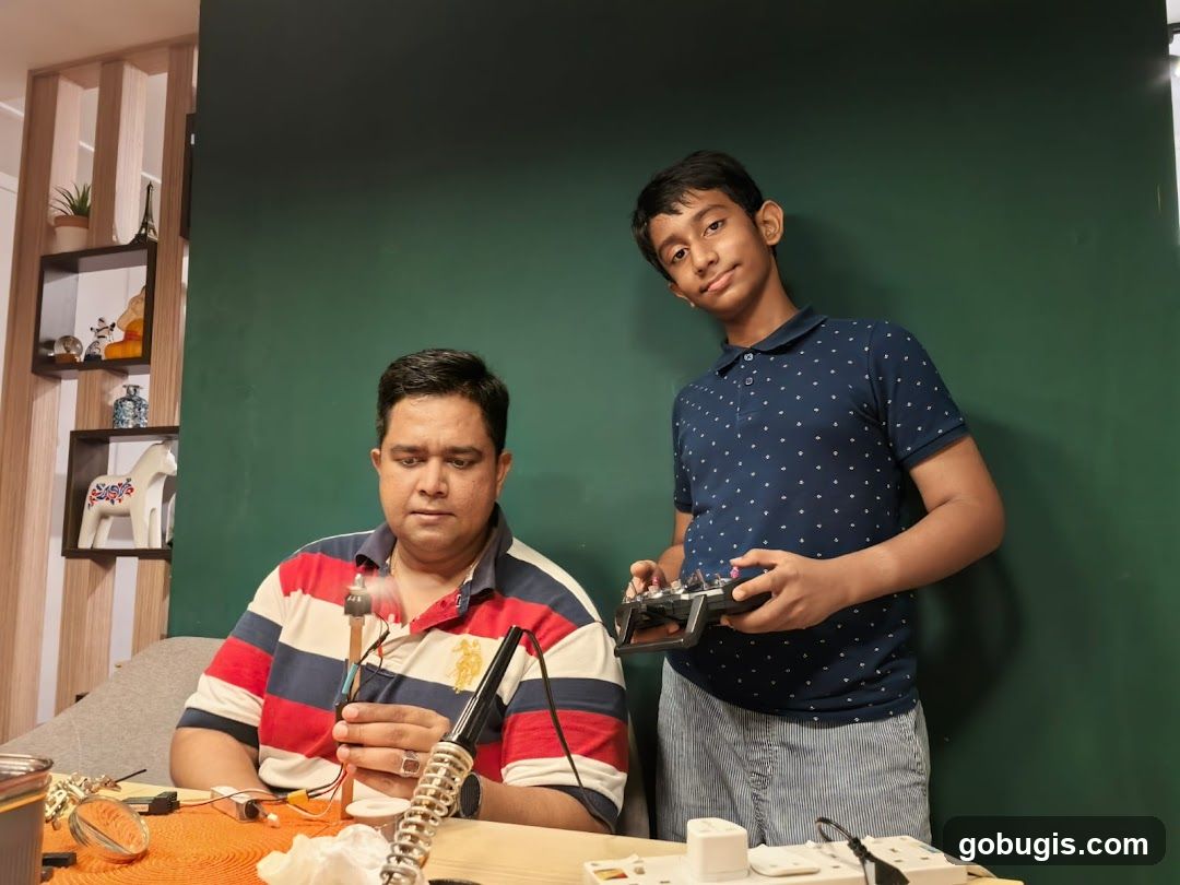 Father and son working on a project
