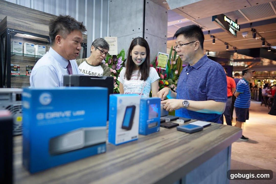 People looking at electronic devices