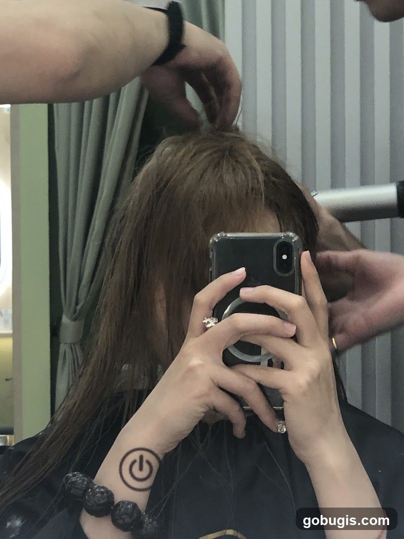Hairdresser styling hair