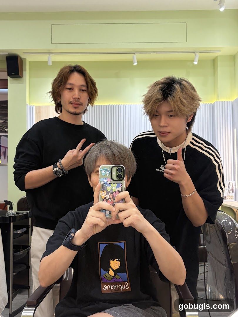 Three people in a salon