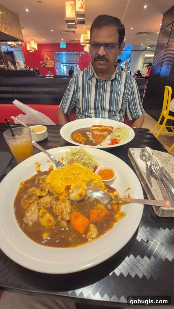 Man eating curry rice