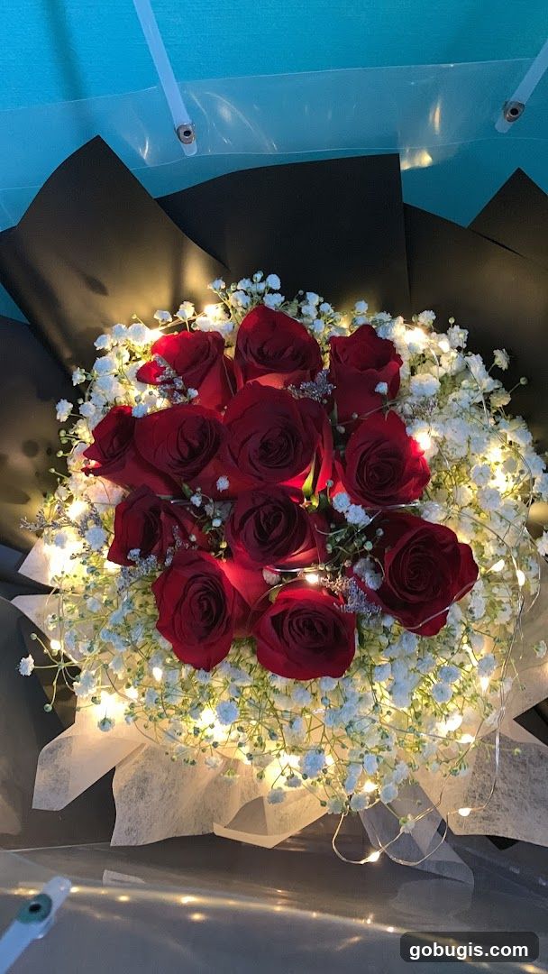 Bouquet of Red Roses with Baby's Breath and Fairy Lights