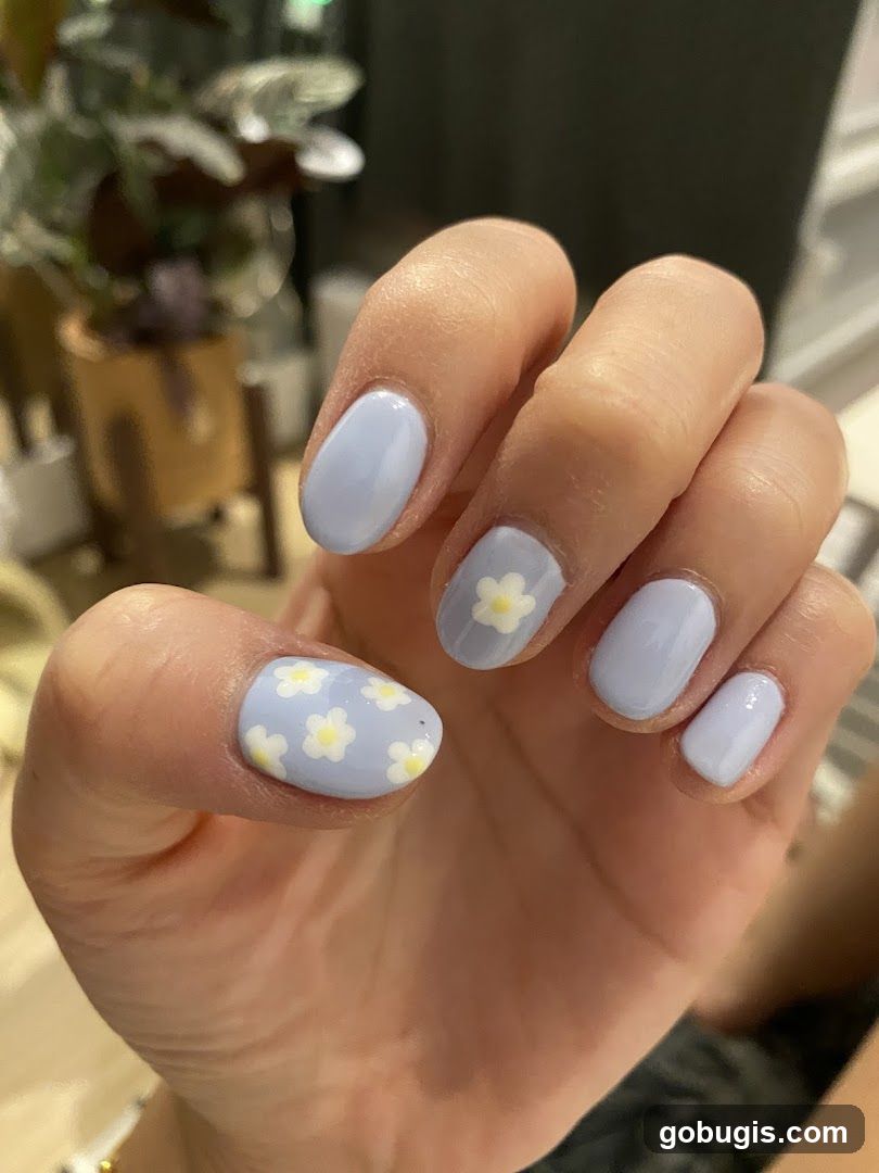 Light Purple Nails with Daisy Design