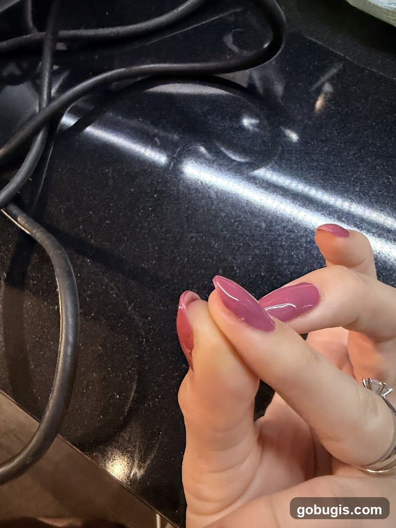 Close-up of hands with manicured nails