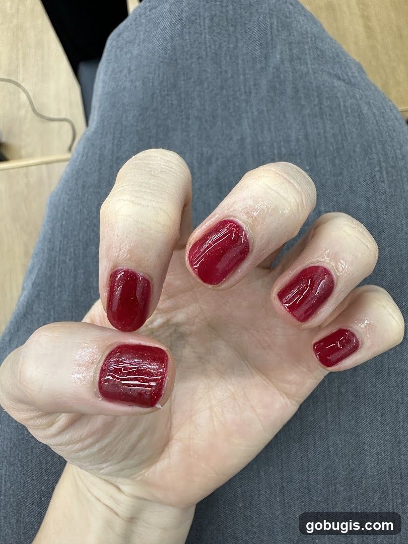 Hand with Red Nails