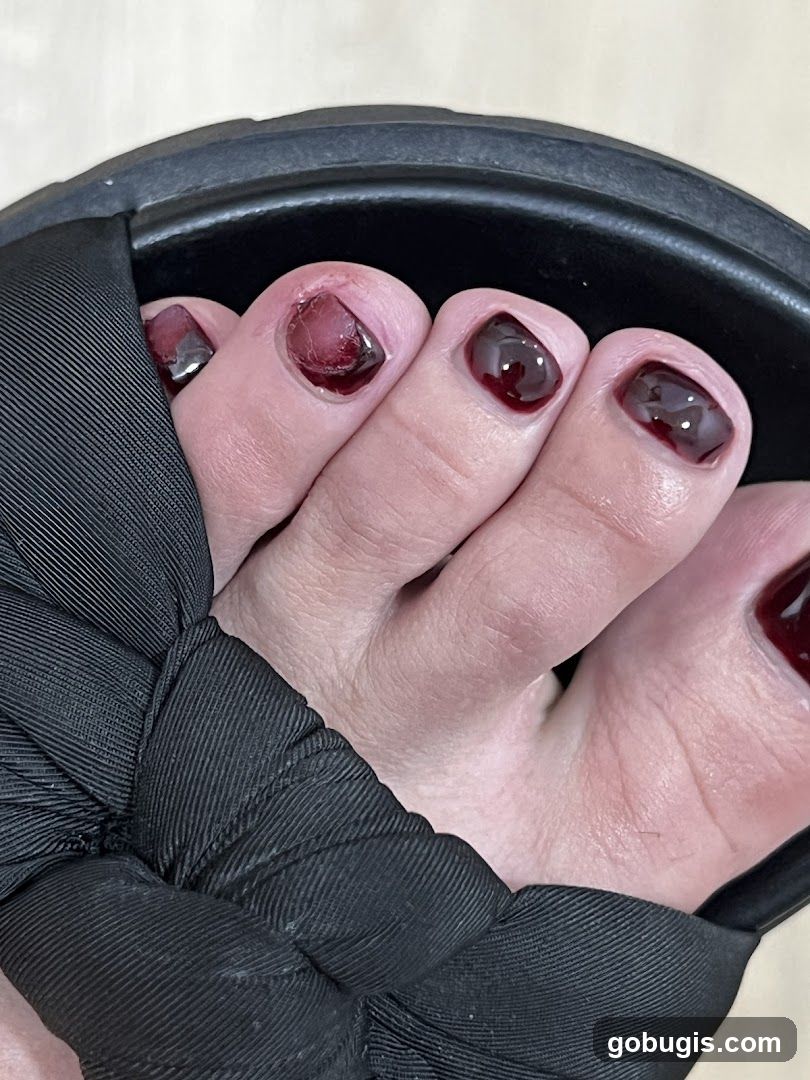 Toenails with Dark Red Polish